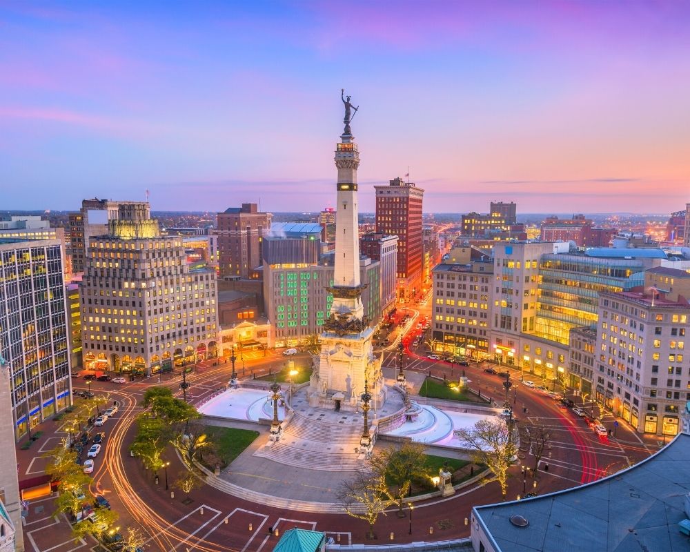 Indianapolis monument with traffic below, How much does it cost to live in Indianapolis